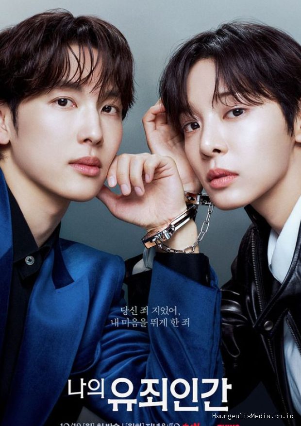 Yim Si Wan dan Seol In Ah terikat dalam satu borgol yang sama dalam poster drama 'Love in Disguise'.